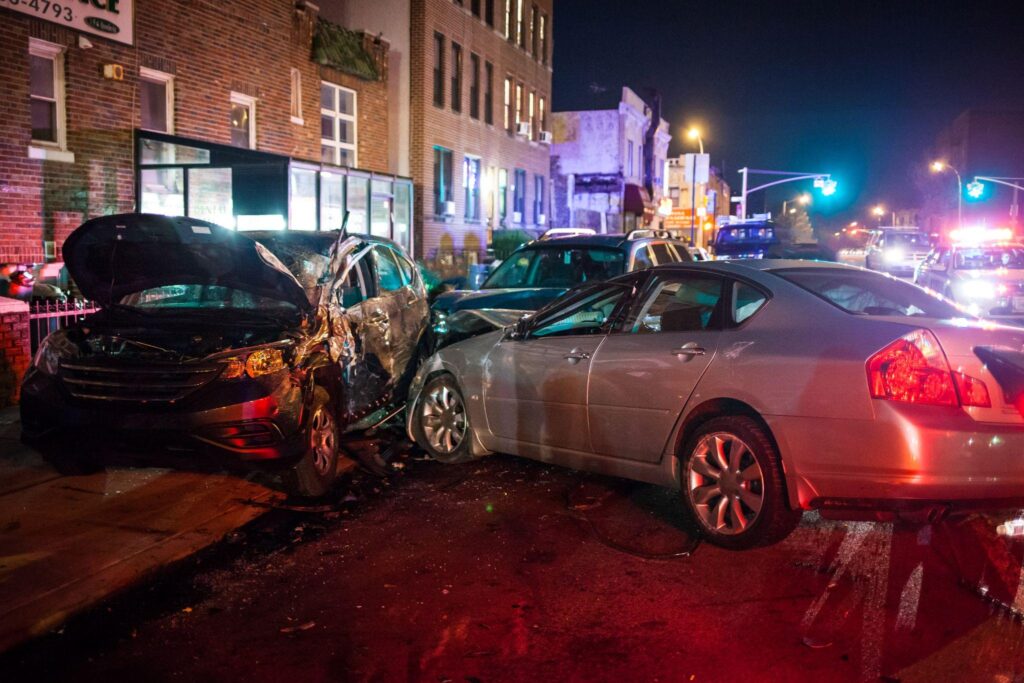 Several car crash at night on city street